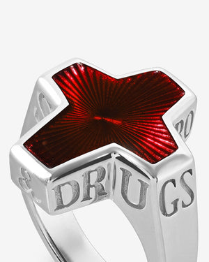 Stephen Webster Sex & Drugs & Rock & Roll enamel ring — angled three-quarter view showing oxblood enamel band and polished silver finish
