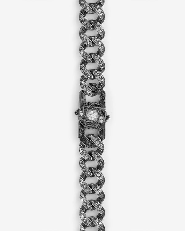Stephen Webster Shaken and Stirred clasp in sterling silver — paired with 18mm Cuban Bracelet in engraved sterling silver