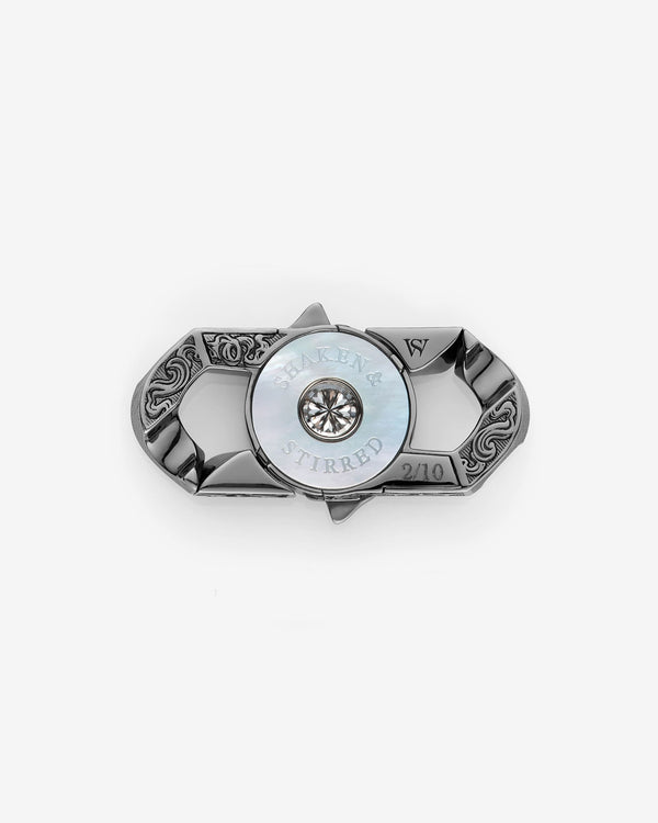 Stephen Webster Shaken and Stirred clasp in 18k white gold with white & black diamonds and mother of pearl back plate — back view