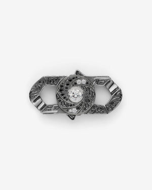 Stephen Webster Shaken and Stirred clasp in 18k white gold with white & black diamonds and mother of pearl back plate — front view