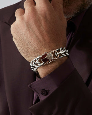 Model wearing Stephen Webster Red Enamel Stag Beetle Bracelet — silver chain and red-enamel beetle head bracelet