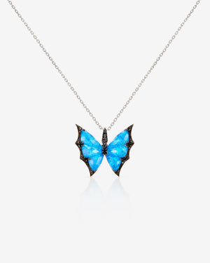 Stephen Webster Black Opalescent Crystal Haze butterfly pendant in 18 ct white gold — front view