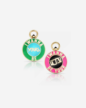 Stephen Webster I Wanna Be Your Bonus Track pendant — 18 ct yellow gold flip-pendant with enamel inlay reading “I Wanna Be Your Bonus Track”, front view