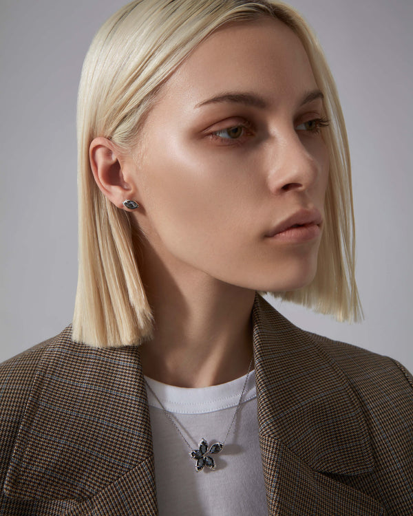 Stephen Webster Crystal Haze Chance Hematite Stud Earrings styled with coordinating luxury jewellery pieces
