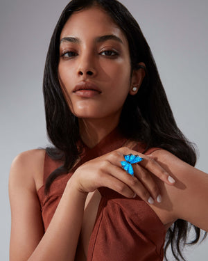 Model wearing Stephen Webster Crystal Haze cocktail ring — 18 ct white gold butterfly statement ring