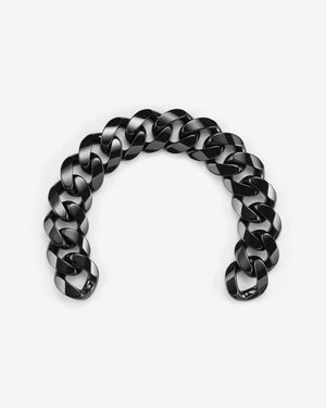 Stephen Webster black ceramic Cuban bracelet — full length laid flat, polished black ceramic links visible