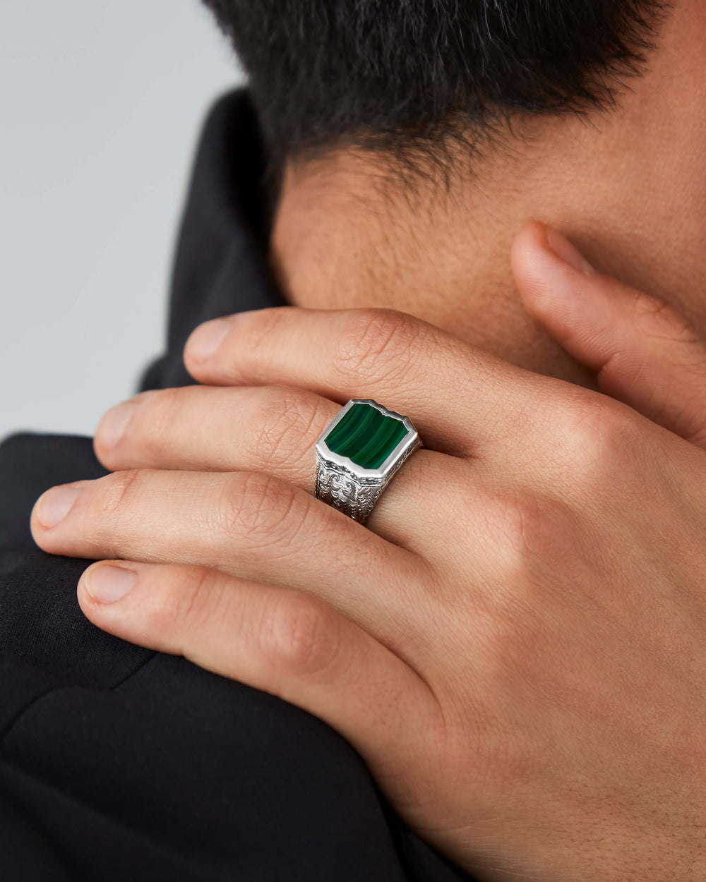Stephen Webster Cuban Leaf pinky ring in sterling silver with malachite centre — top view showing engraved leaf-pattern band and rich green malachite gemstone