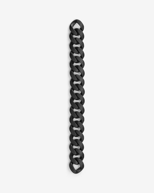 Close-up of Stephen Webster Cuban matt black ceramic bracelet — detailed view of matte ceramic link surface and link joints