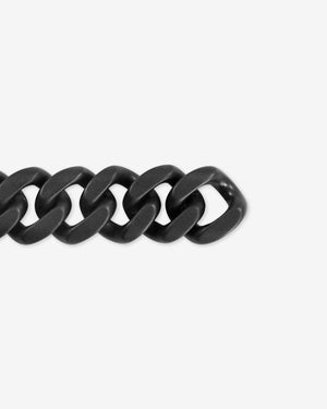 Close-up of Stephen Webster Cuban matt black ceramic bracelet — detailed view of matte ceramic link surface and link joints