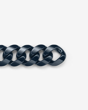 Close-up of Stephen Webster Cuban polished navy blue ceramic bracelet — detailed view of polished ceramic link surface and link joints