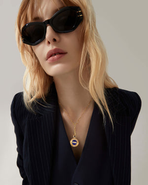 Model wearing Stephen Webster Enamel Diamond gold pendant necklace — showing pendant size, enamel detail, diamond pavé and gold finish