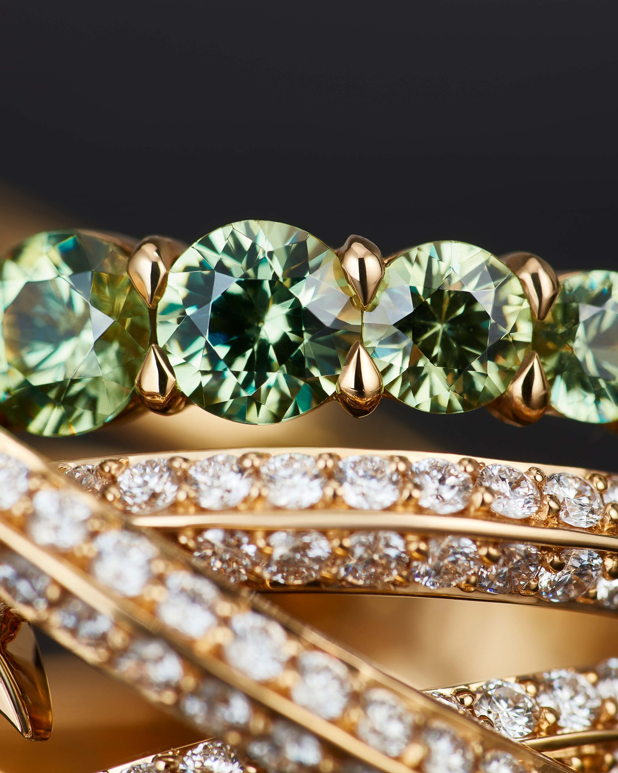 Demantoid green gemstone close-up — rare garnet sourced for Stephen Webster designs