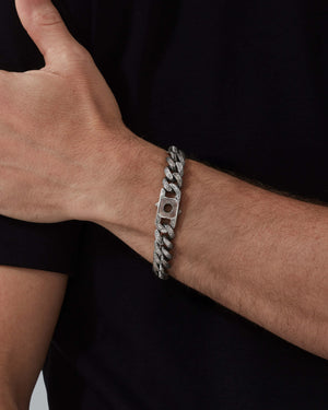 Model wearing Stephen Webster Half Corona Clasp in sterling silver with black mother of pearl on wrist