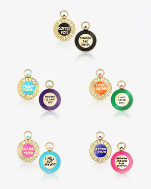 Stephen Webster I Wanna Be Yours Collector’s Edition — all five 18 ct gold pendants plus gold fob chain displayed together on grey background