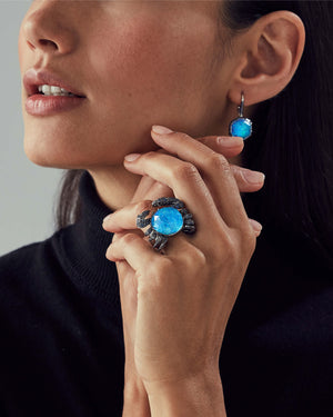 Model wearing the Stephen Webster Jewels Verne Crab Crystal Haze ring on the hand, illustrating scale, sculptural form and statement luxury jewellery styling.