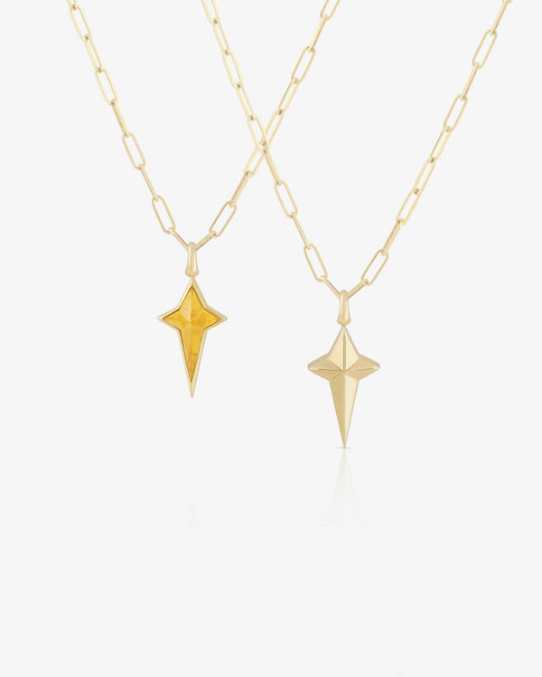 Stephen Webster New Cross pendant in 18 ct yellow gold with citrine inlay on 24″ chain — front and back view showing cross shape and golden-citrine stone