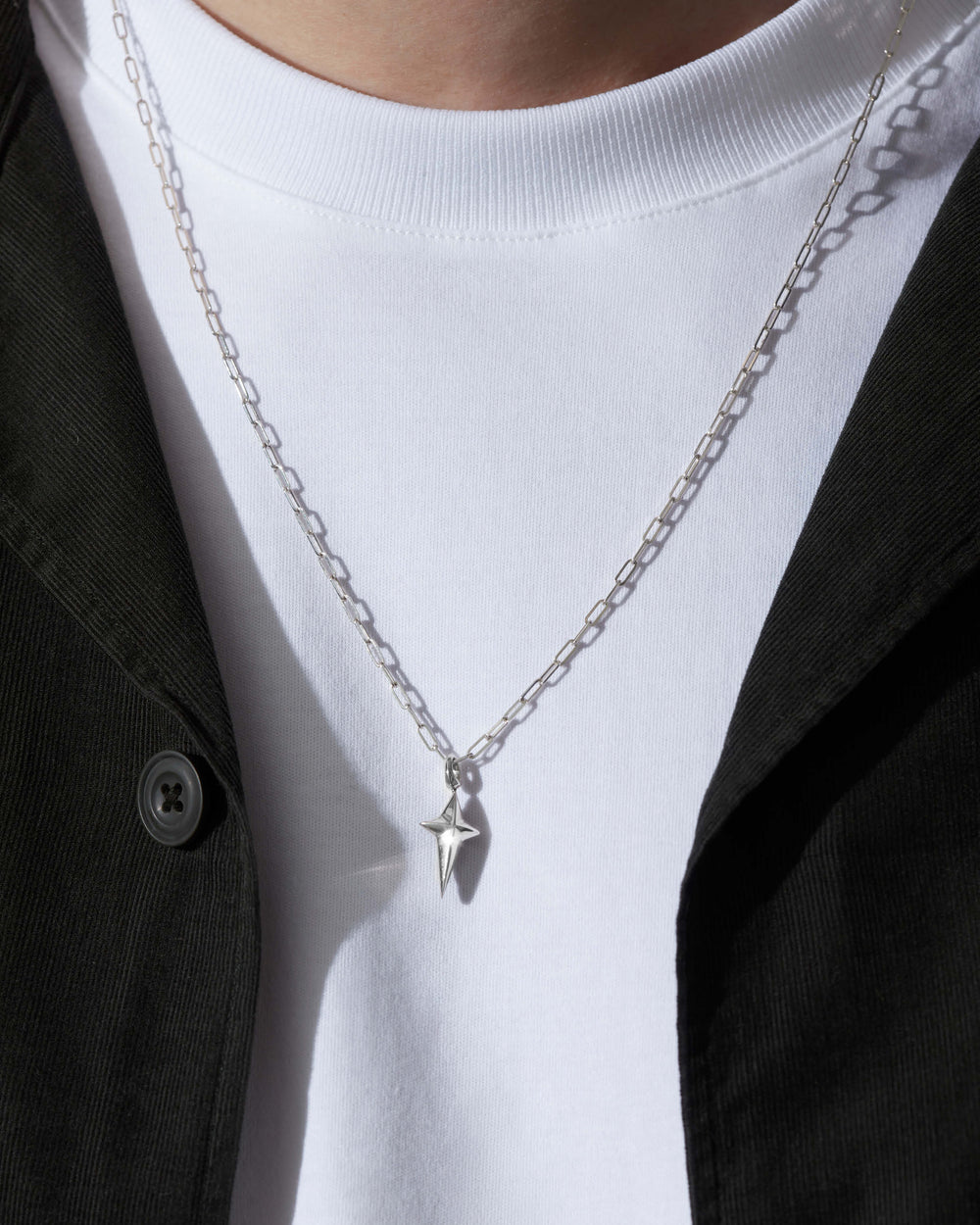 Stephen Webster New Cross pendant in sterling silver hanging on chain — full pendant shape visible