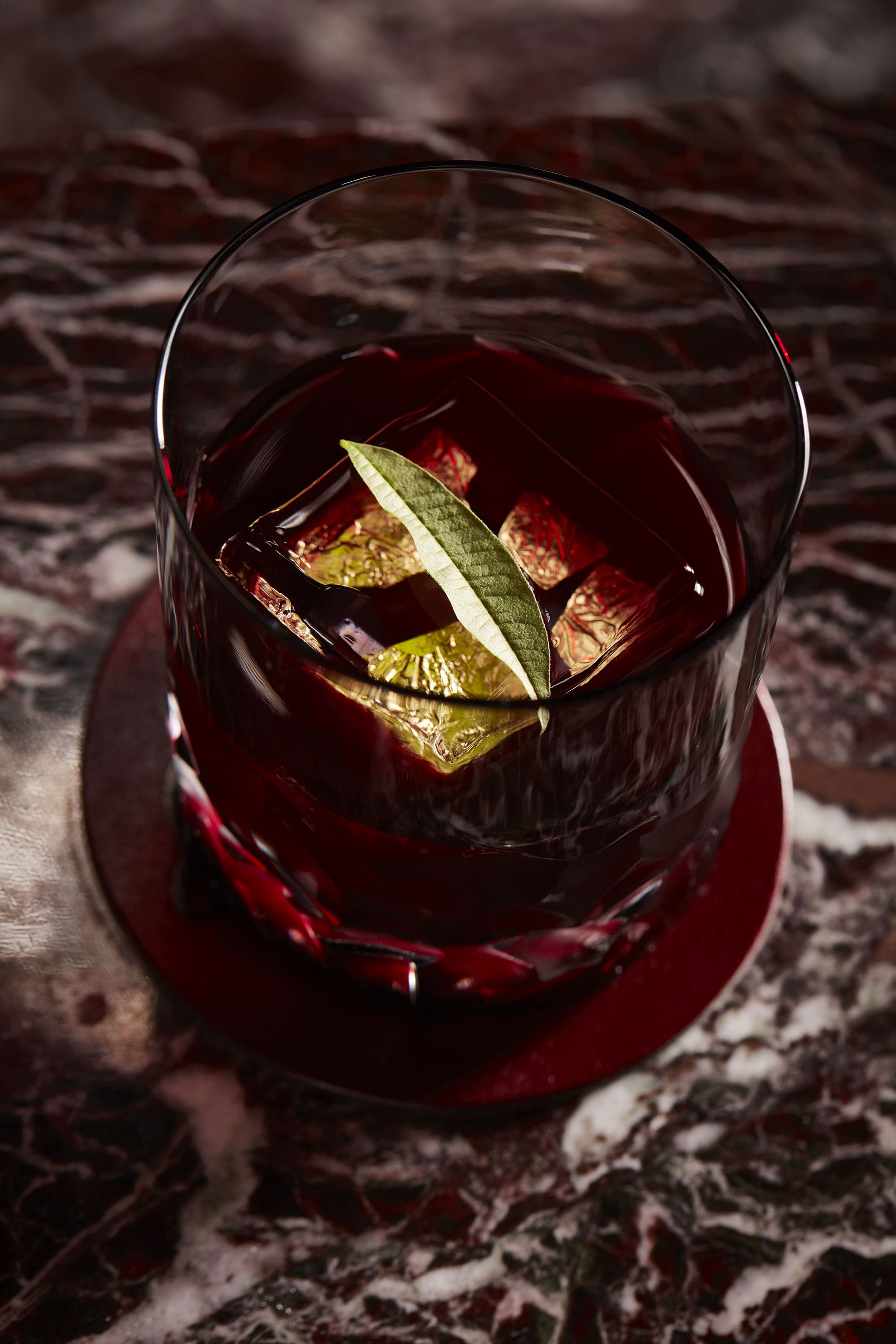 Close-up of artisan cocktails served at No Regrets Lounge cocktail bar