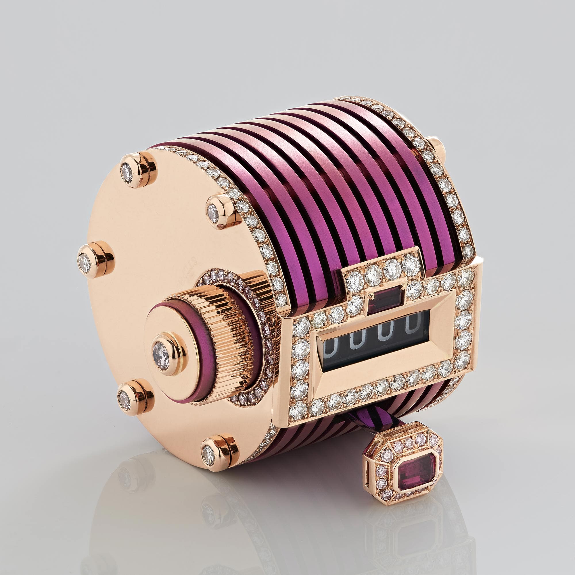 Close-up of RESET clicker design showing diamond and ruby detailing