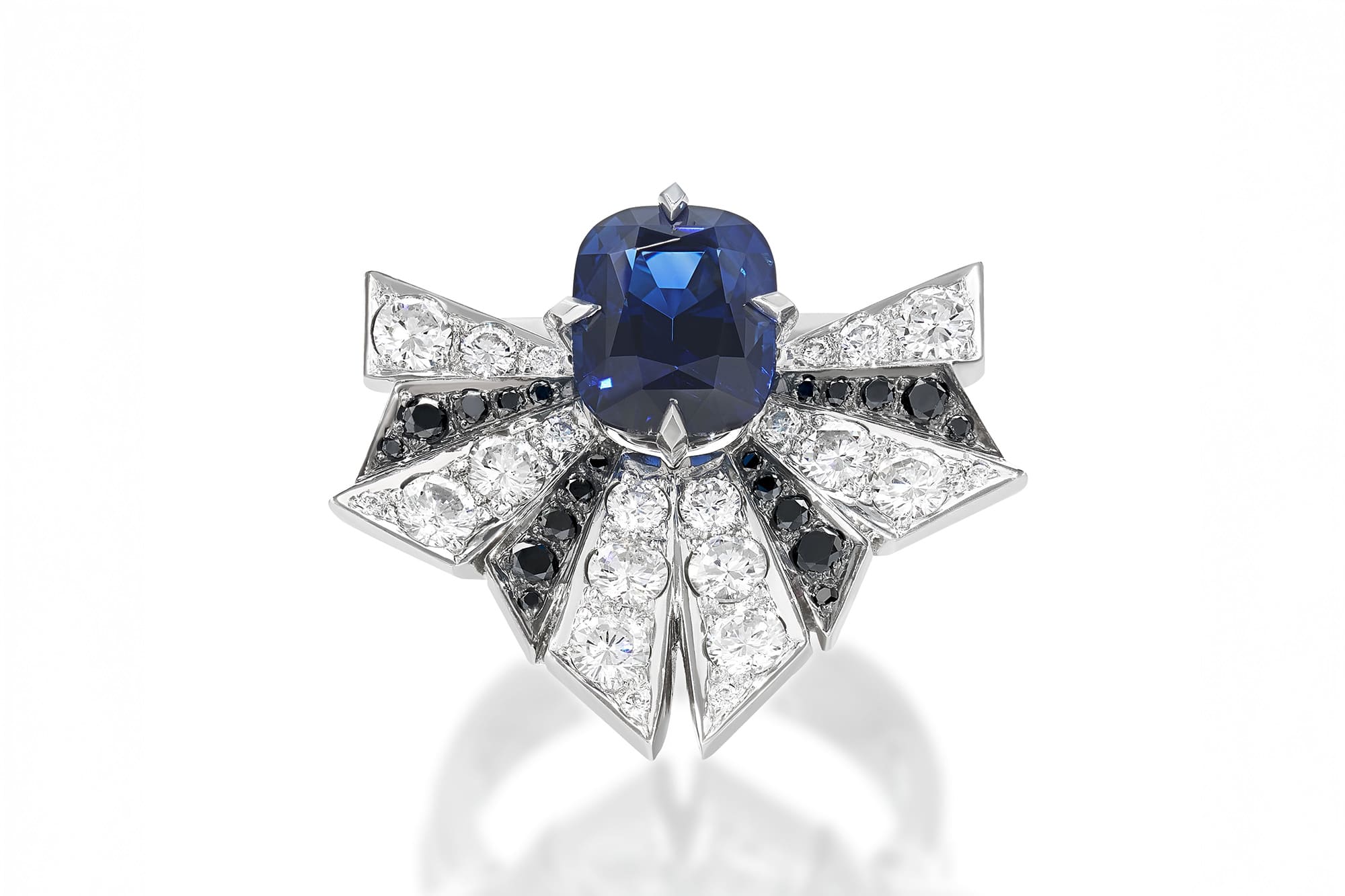 Refined solitaire with diamond-studded outer jacket created via RESET redesign