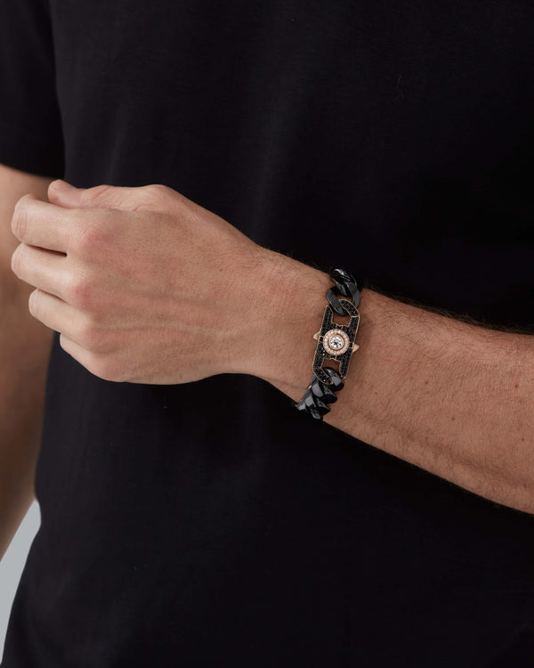 Model wearing Stephen Webster Revolutionary Clasp 18K rose gold and white diamond on wrist