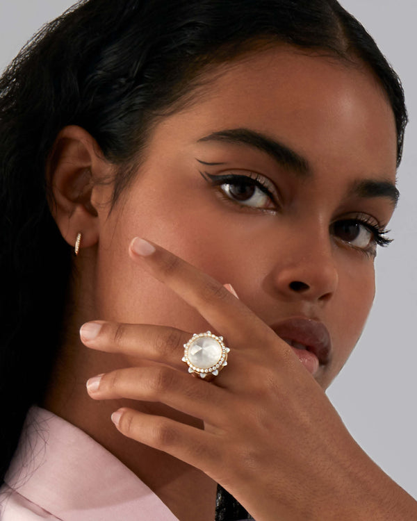 Model wearing the Stephen Webster Russian Roulette Pearl Bullet ring on hand, illustrating scale, contrast and statement luxury styling
