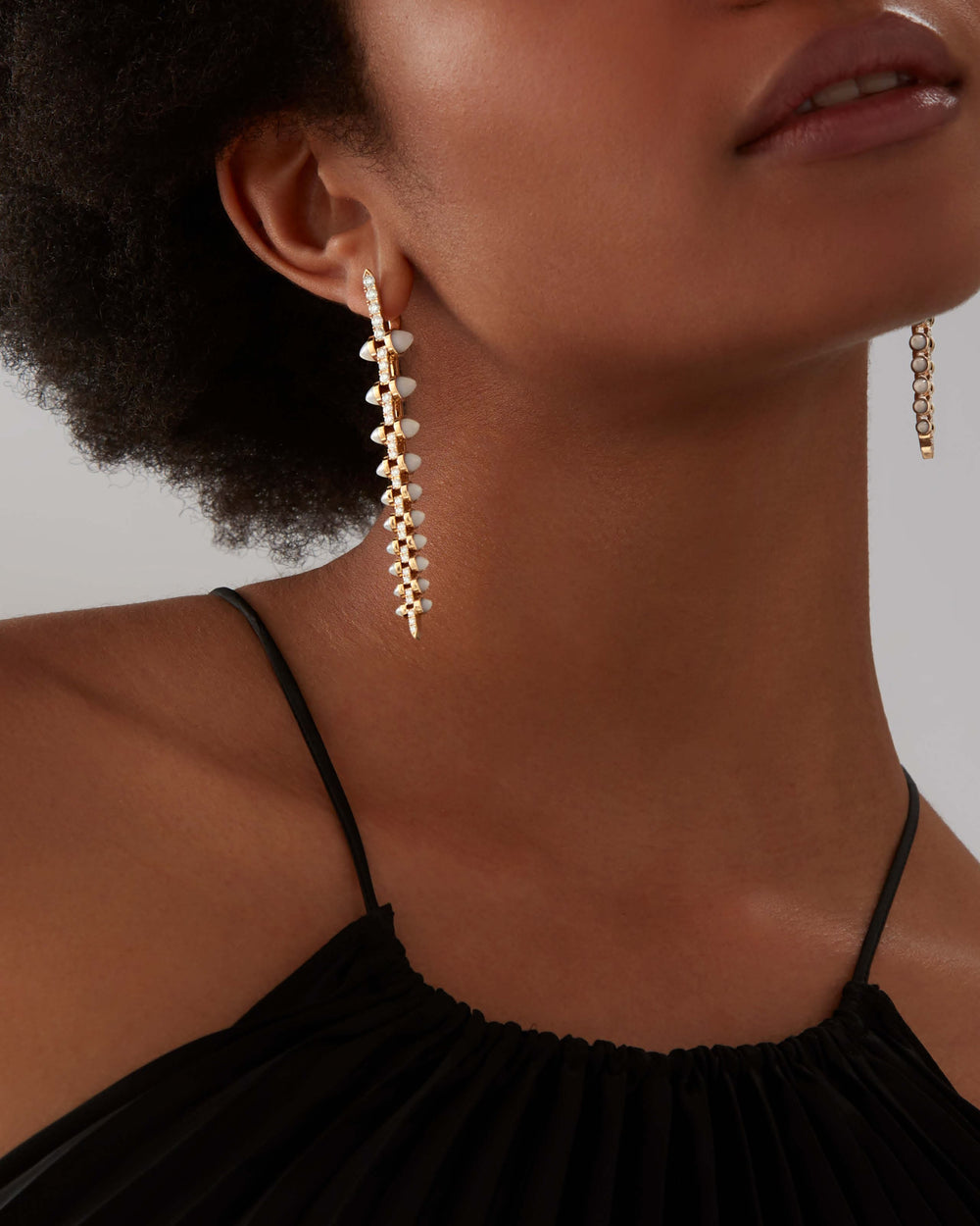 Stephen Webster White Diamond Russian Roulette Stiletto earrings in 18ct gold with pavé white diamonds and mother-of-pearl bullet motifs, bold British fine jewellery design