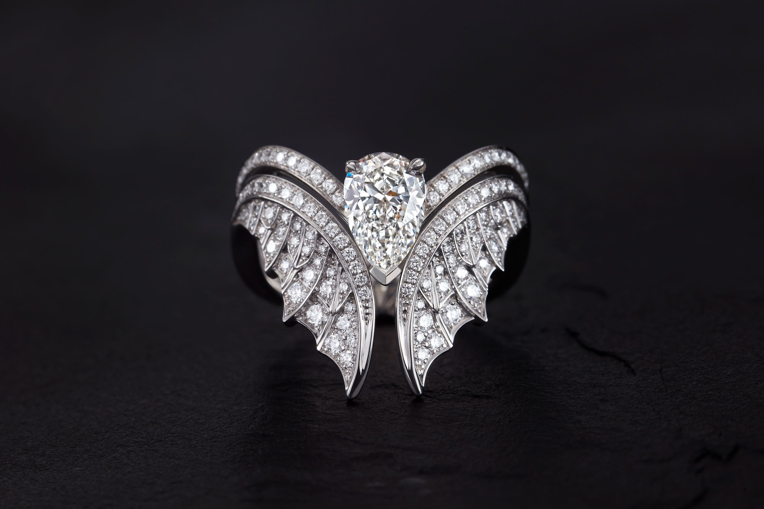 Graphic illustrating The Party Jacket jewellery concept showing an engagement ring combined with a jacket ring