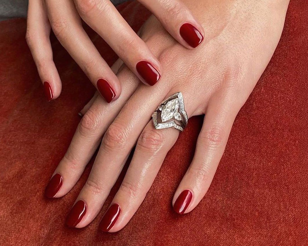 Example of marquise cut bespoke engagement ring paired with Party Jacket outer ring