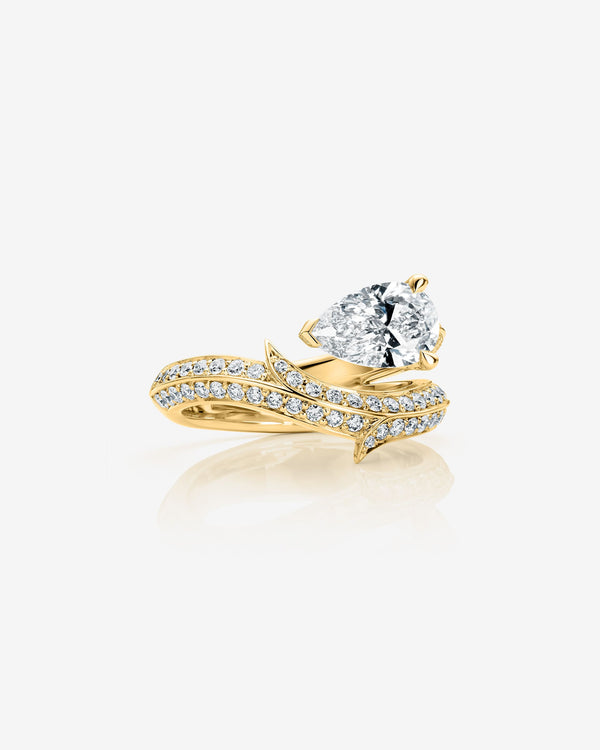 Stephen Webster Thorn Floating Solitaire Pavé Ring in 18ct yellow gold with pear-cut white diamond and pavé diamonds