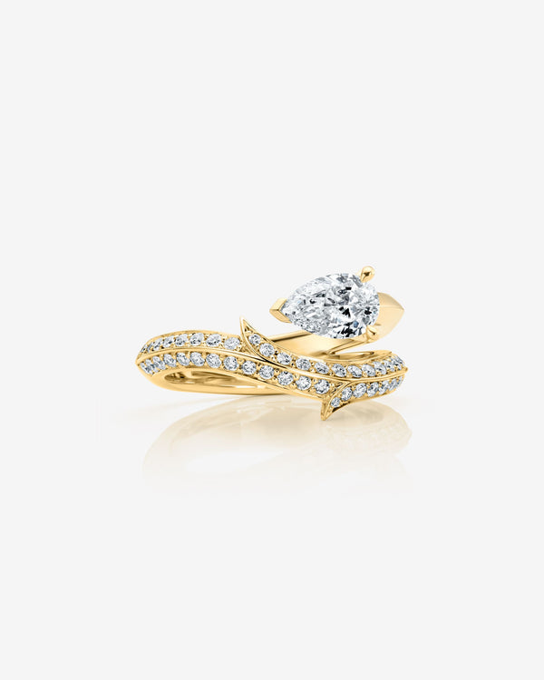 Stephen Webster Thorn Floating Solitaire Pavé Slimline Ring in 18ct yellow gold with pear-cut white diamond and pavé diamonds engagement ring