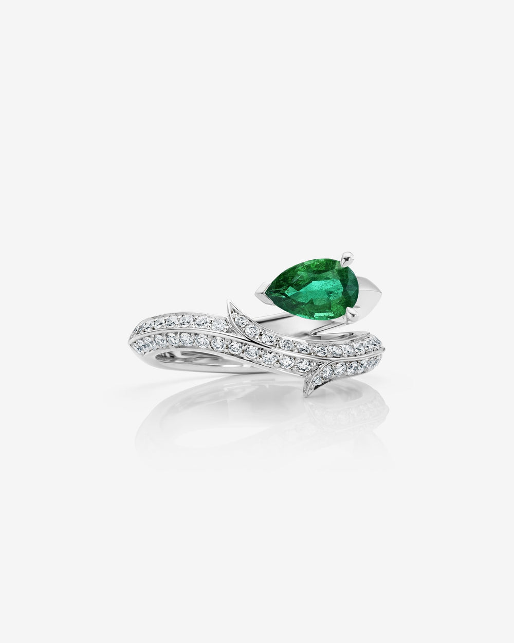 Stephen Webster Thorn Floating Solitaire Pavé Slimline Ring in platinum with pear-cut emerald and pavé diamonds engagement ring