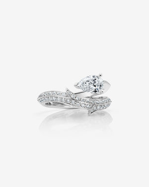 Stephen Webster Thorn Floating Solitaire Pavé Slimline Ring in platinum with pear-cut white diamond and pavé diamonds engagement ring
