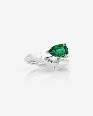 Stephen Webster Thorn Floating Solitaire Ring in platinum with pear-cut emerald luxury engagement ring