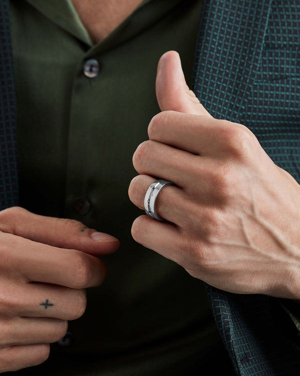 Model wearing Stephen Webster Thorn Inscription Band in 18 k white gold