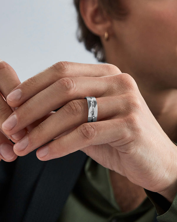 Model wearing Stephen Webster Thorn Inscription Band in 18 k white gold