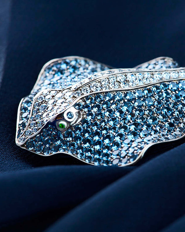 Close-up of the Stephen Webster Titanium Stingray brooch showcasing pavé grey spinels, brilliant white diamonds and tsavorite eyes with expert craftsmanship