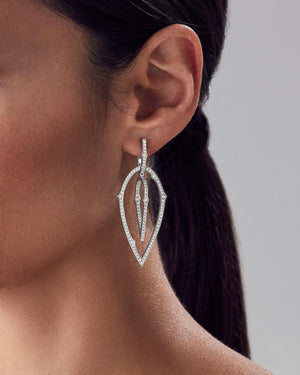 Stephen Webster White Diamond Pavé Stem 3D Hoop Earrings in 18ct White Gold worn on model close up