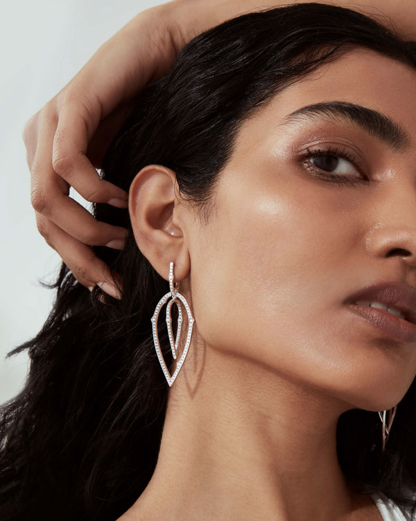 Stephen Webster White Diamond Pavé Stem 3D Hoop Earrings in 18ct White Gold worn on model close up