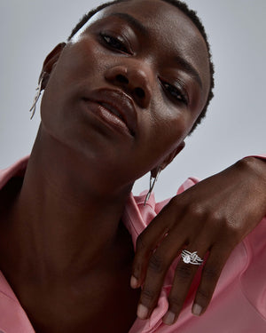 Stephen Webster Forget Me Knot Band in 18ct White Gold worn on model close up