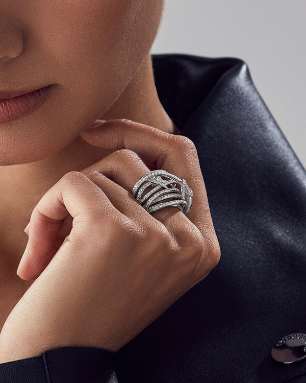Stephen Webster Knot Bandeau Ring in 18ct White Gold with white diamond pavé worn on model close up