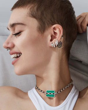 Stephen Webster White Gold Knot White Diamond Earstuds styled with coordinating luxury jewellery pieces