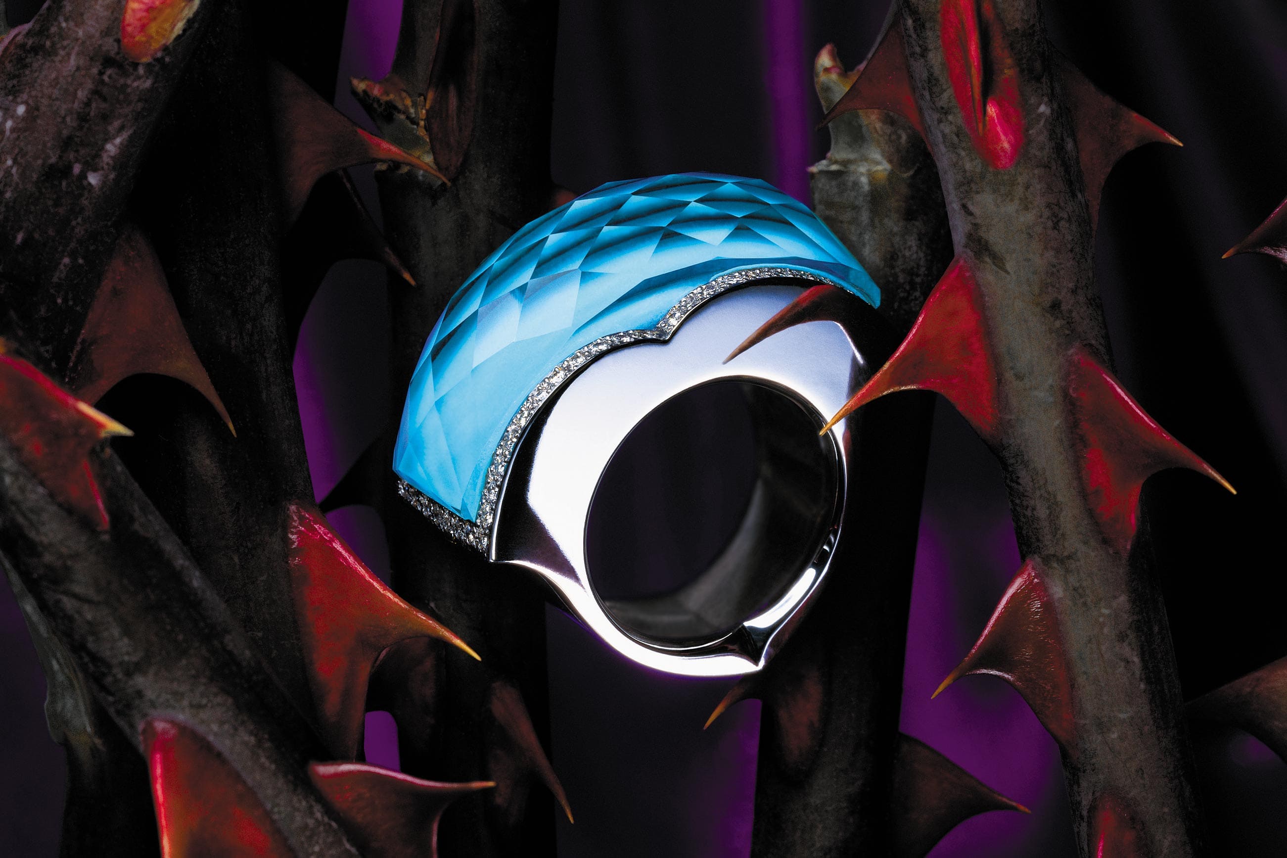 Stephen Webster Crystal Haze gemstone technique showcasing layered stones with hypnotic effects