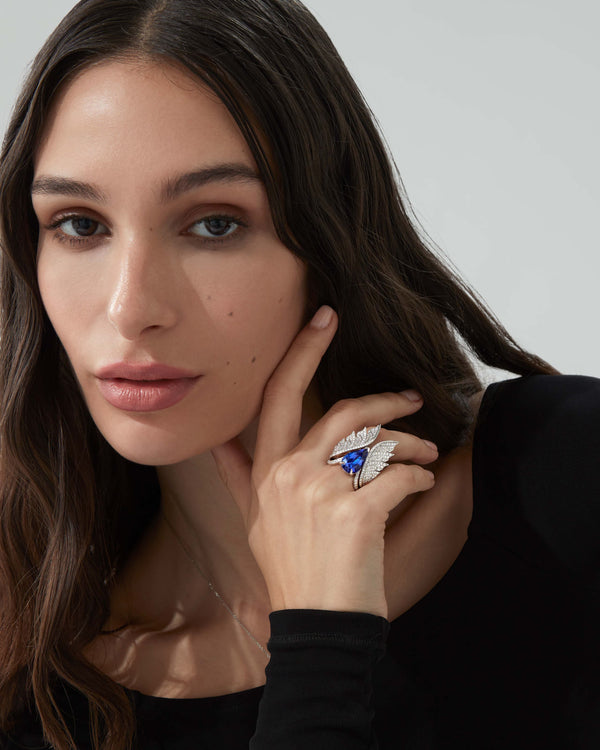 Tanzanite Pear Inner Cocktail Ring worn on hand showcasing vibrant gemstone and diamond pavé design