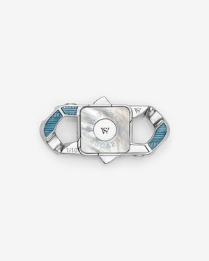 Stephen Webster Great Escape clasp in sterling silver with black diamond pavé, blue & orange enamel and mother of pearl back plate — back view