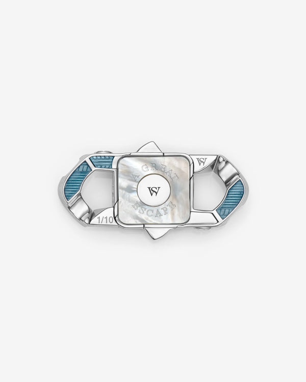 Stephen Webster Great Escape clasp in sterling silver with black diamond pavé, blue & orange enamel and mother of pearl back plate — back view