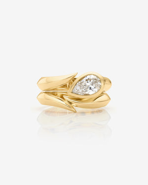 Thorn Arc Solitaire yellow gold wedding band styled with matching engagement ring
