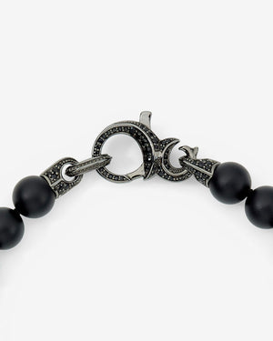 Clasp and connection detail of Stephen Webster Thorn Beaded Bracelet with black sapphire and sterling silver components