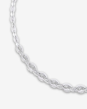 Close-up of white diamond pavé links on the Thorn Embrace Chain Link White Diamond Choker in 18 ct white gold