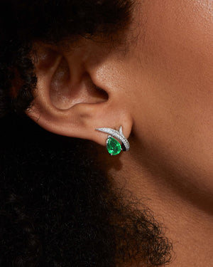 Thorn Embrace Pear Emerald Stud Earrings worn on ear, luxury fine jewellery styling